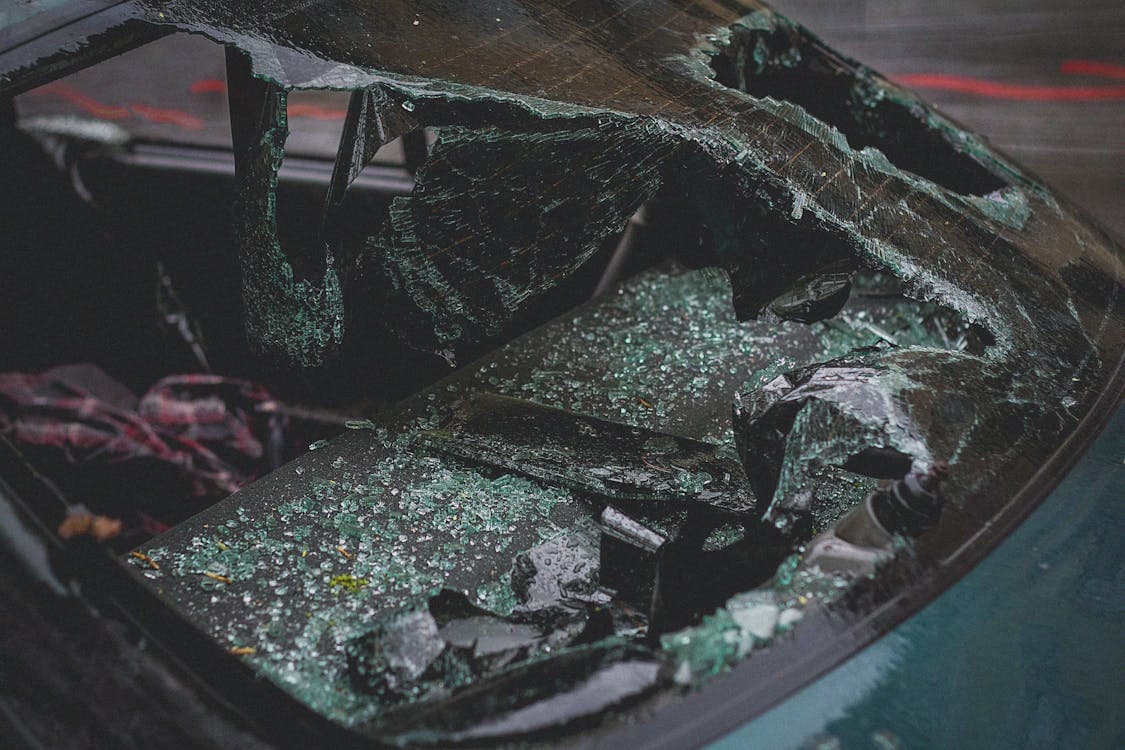 Shattered car windshield from a serious collision — representing U.S. traffic accident statistics
