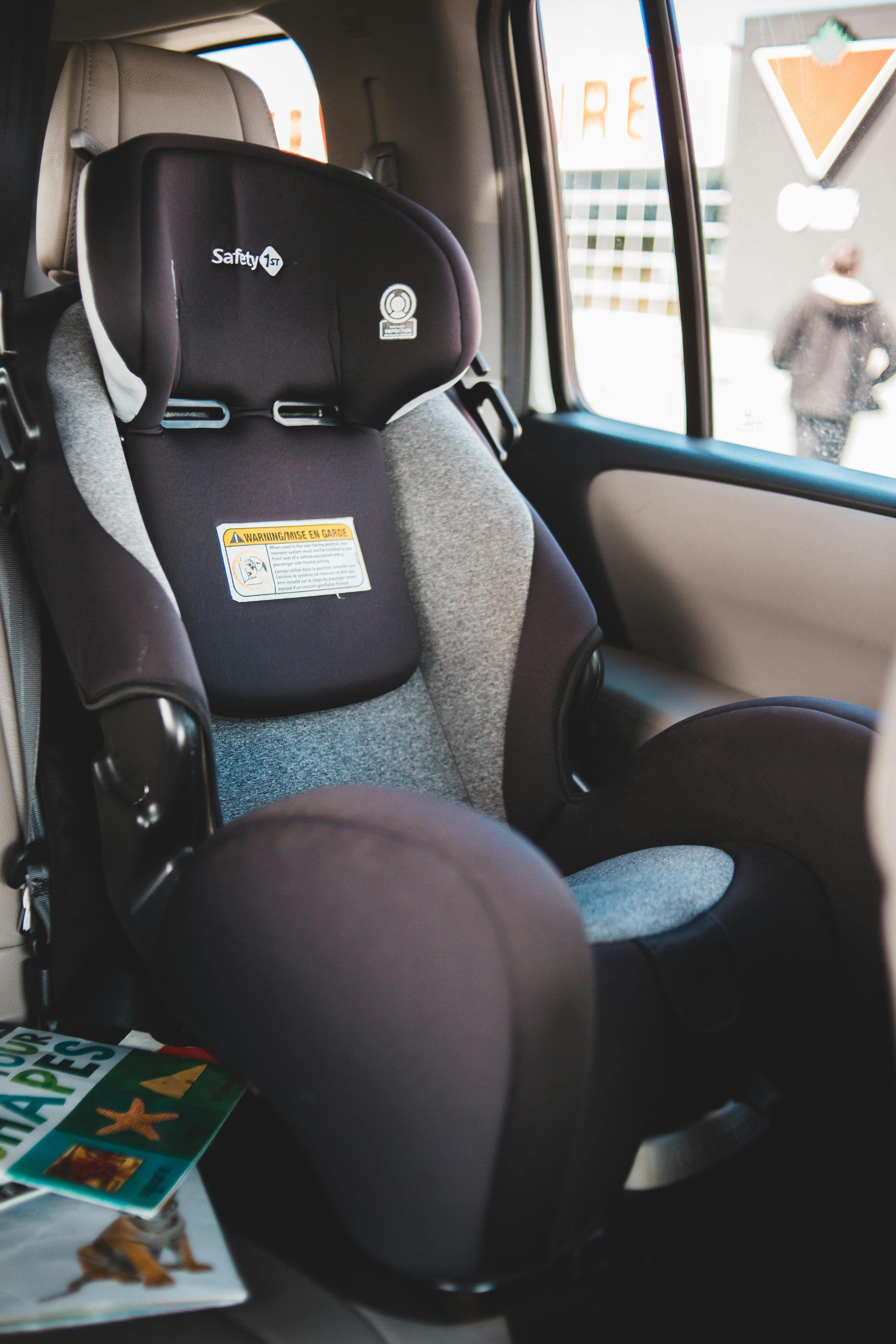 Safety 1st car seat installed and secured in a vehicle, representing proper child passenger safety