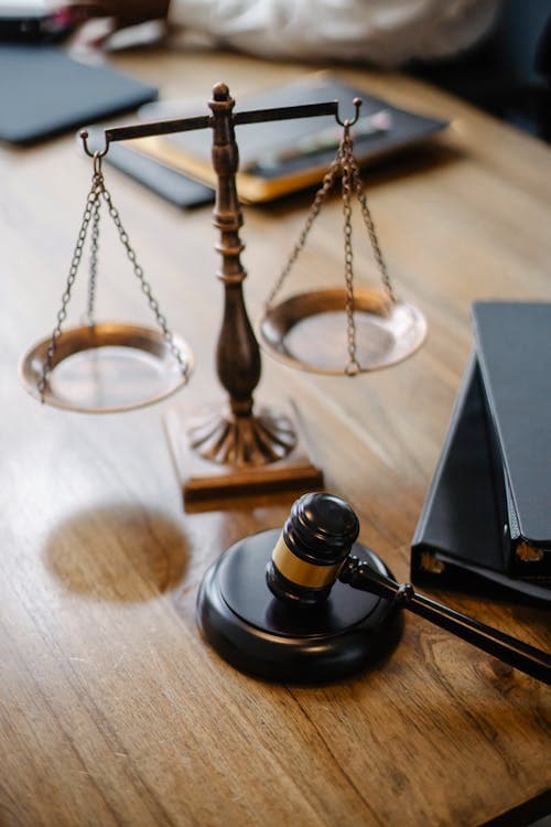 Scales of justice representing car accident attorney fees and legal costs