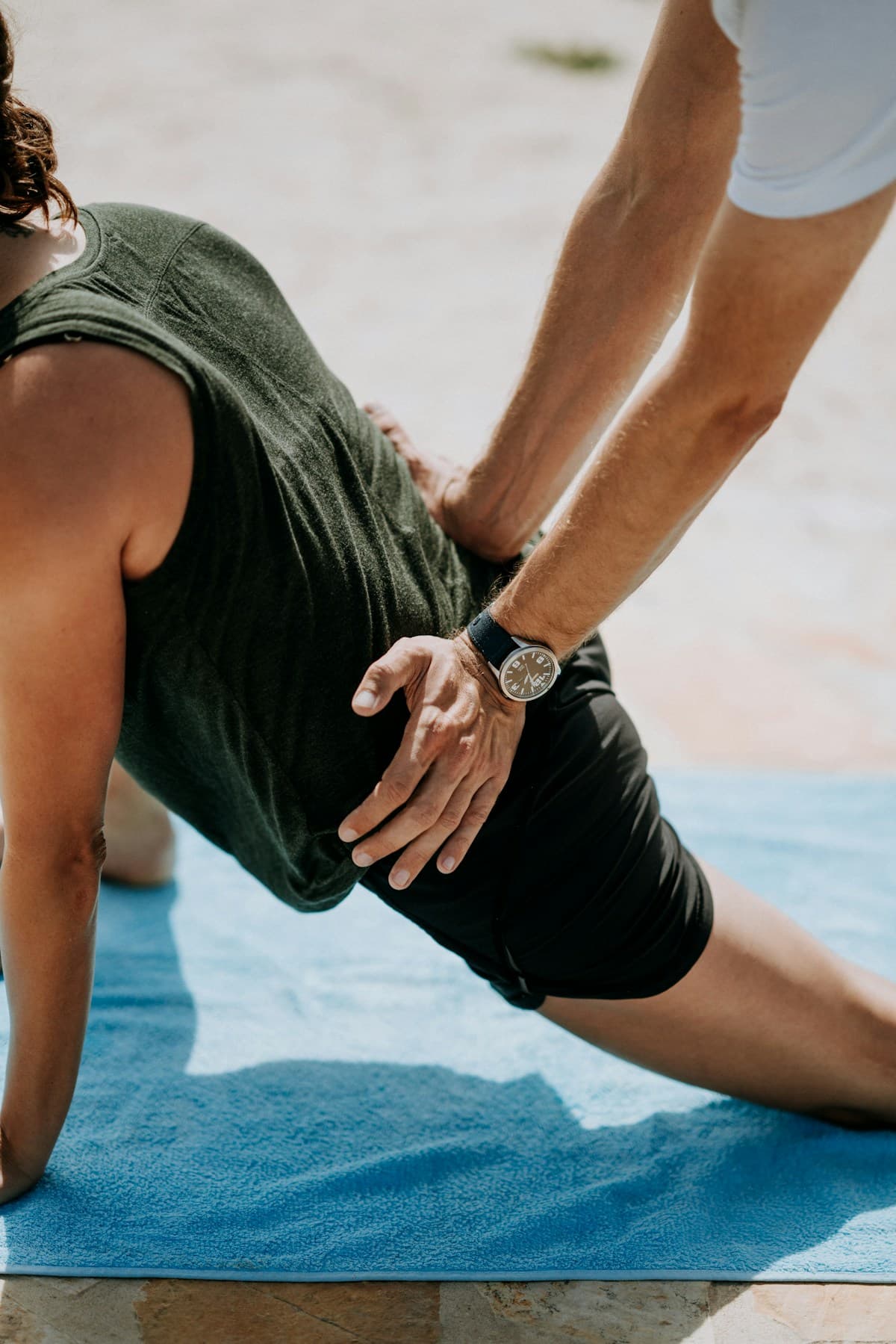 Physical therapist treating a patient with a herniated disc injury